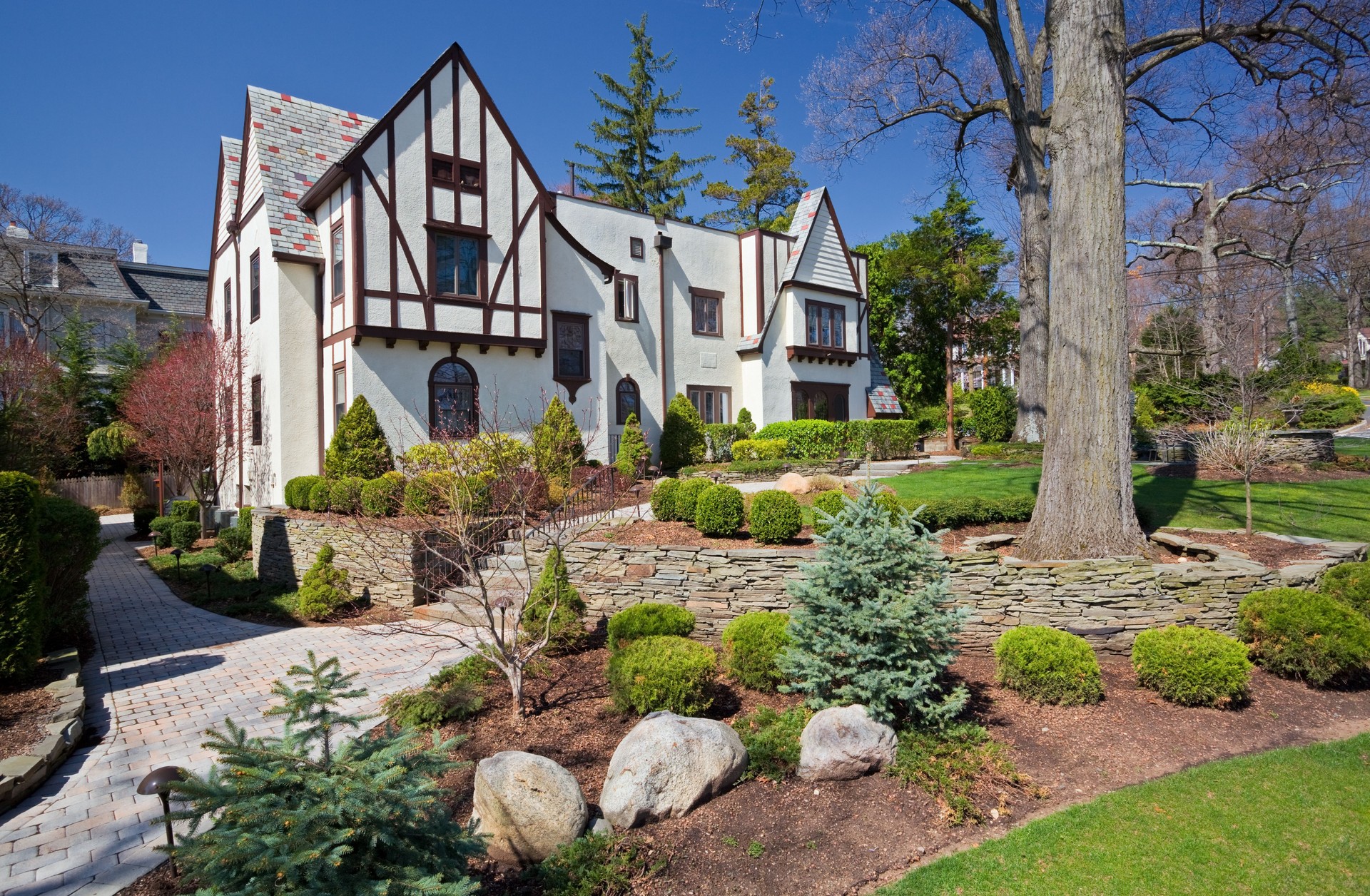 House - Home exterior in Tudorian style, real estate